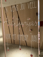 Handlettering op ramen en deuren